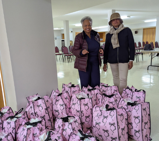 Philethea Circle pose after preparing bags for service project